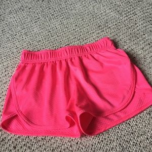 pink athletic shorts, size 7